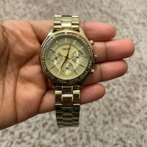 DKNY gold watch with 3 faces